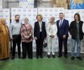 Su Majestad la Reina Doña Sofía con una representación de voluntarios de FEAFES Melilla